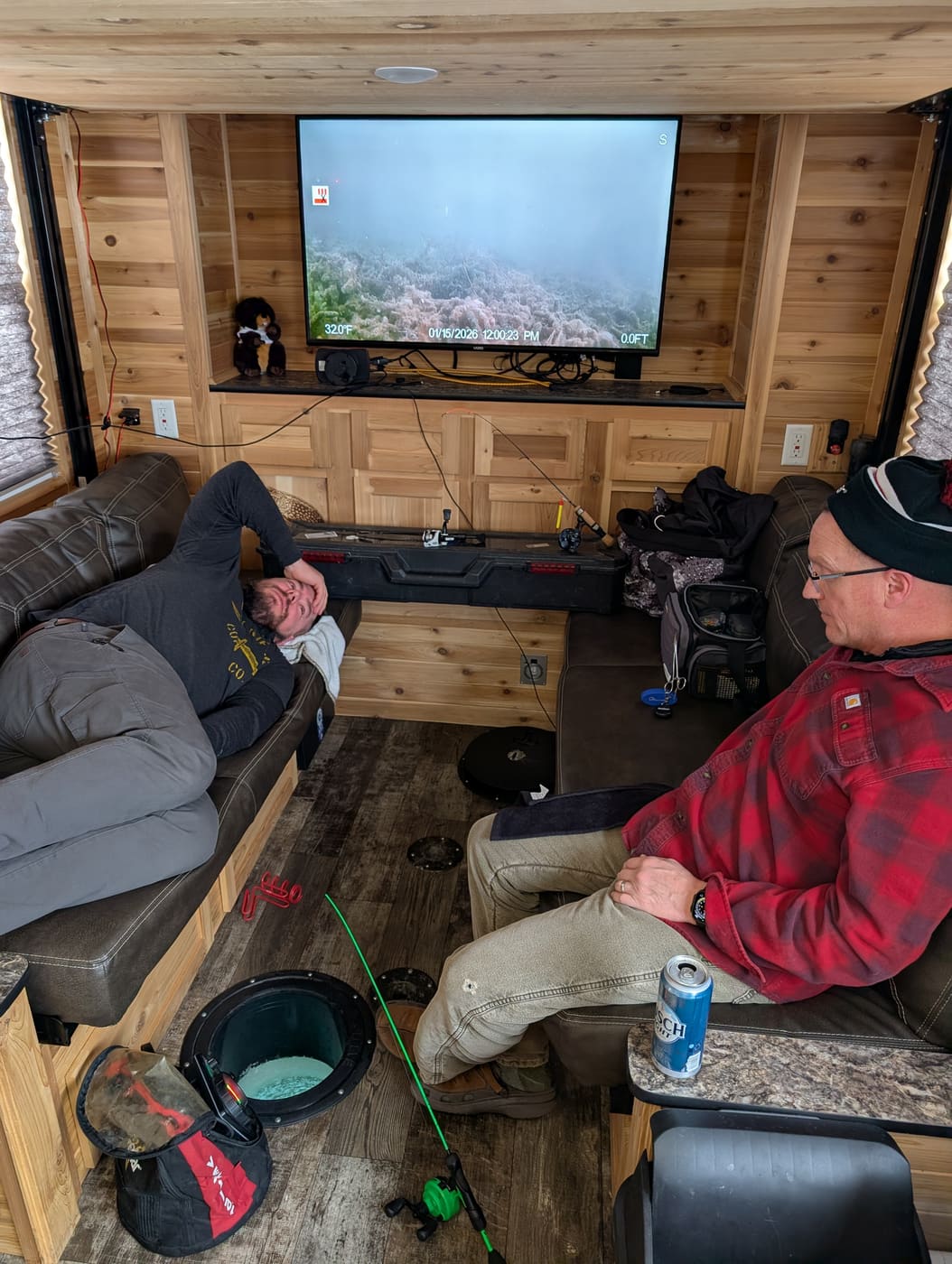 Angler napping in the icehouse with lines down
